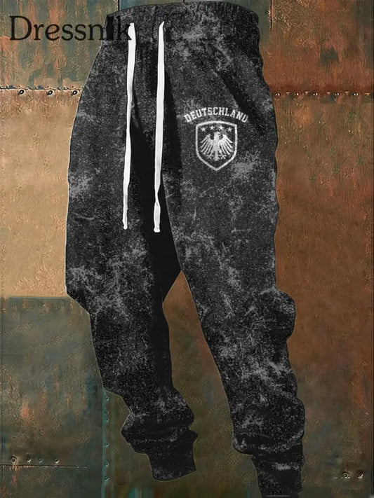 Herren Bold gesprenkelte schwarze ’DEUTSCHLAND’ Eagle Emblem Jogging hose mehrfarbig / S
