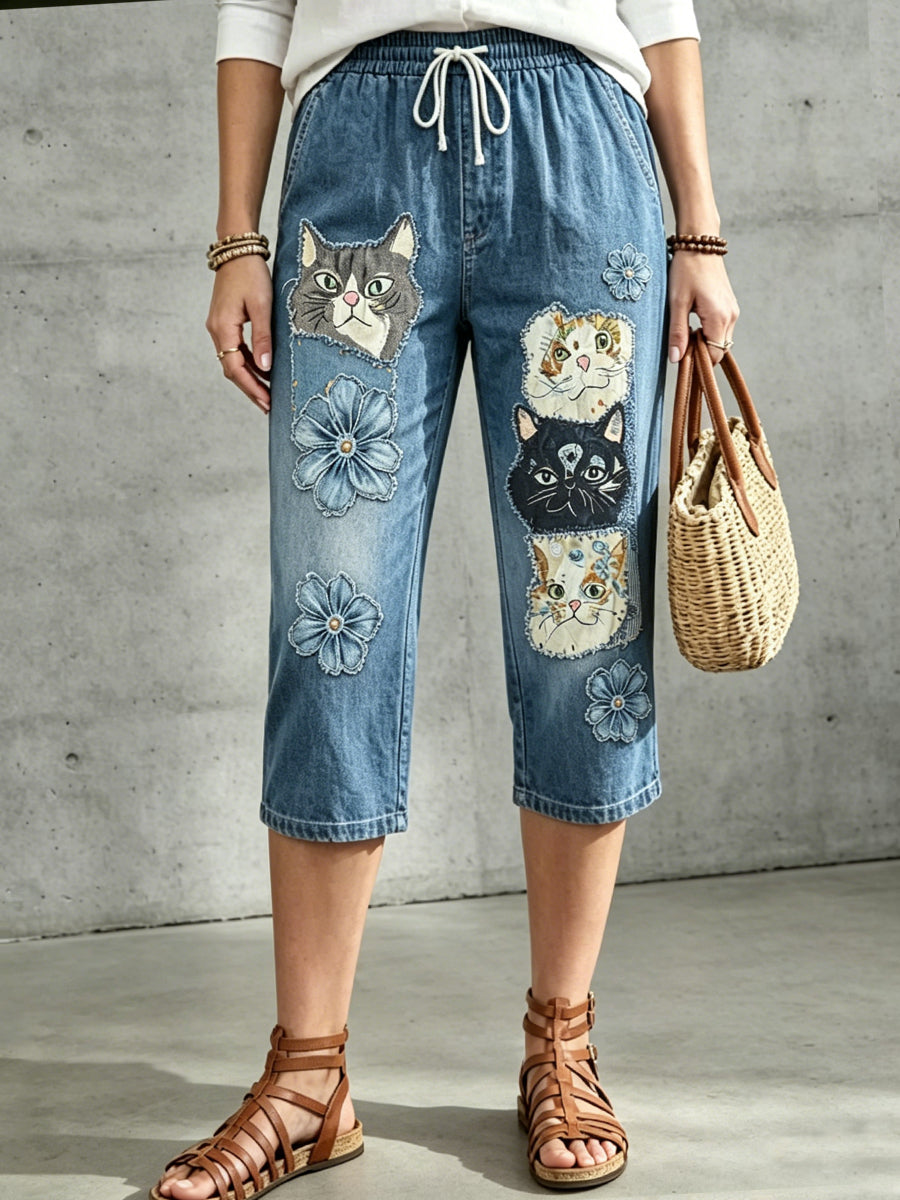 Damen-Hose mit mittlerer Leibhöhe, Blumen- und Tiermotiven sowie Kordelzug