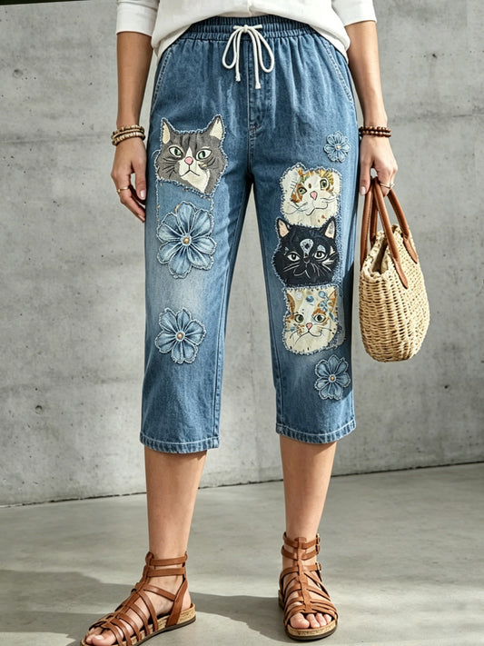 Damen-Hose mit mittlerer Leibhöhe, Blumen- und Tiermotiven sowie Kordelzug
