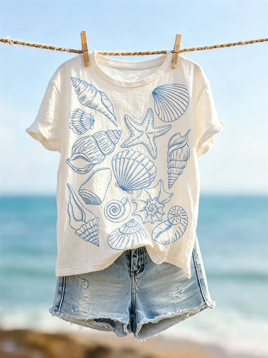 Damen-T-Shirt mit Kurzärmeln und Print von Strand, Seesternen, Muscheln und Schneckenhäusern