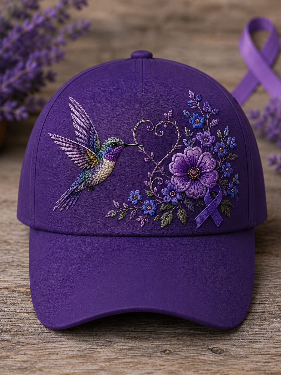 Unisex-Mütze in Lila mit Blumen- und Kolibri‑Muster zur Sensibilisierung für die Alzheimer‑Krankheit