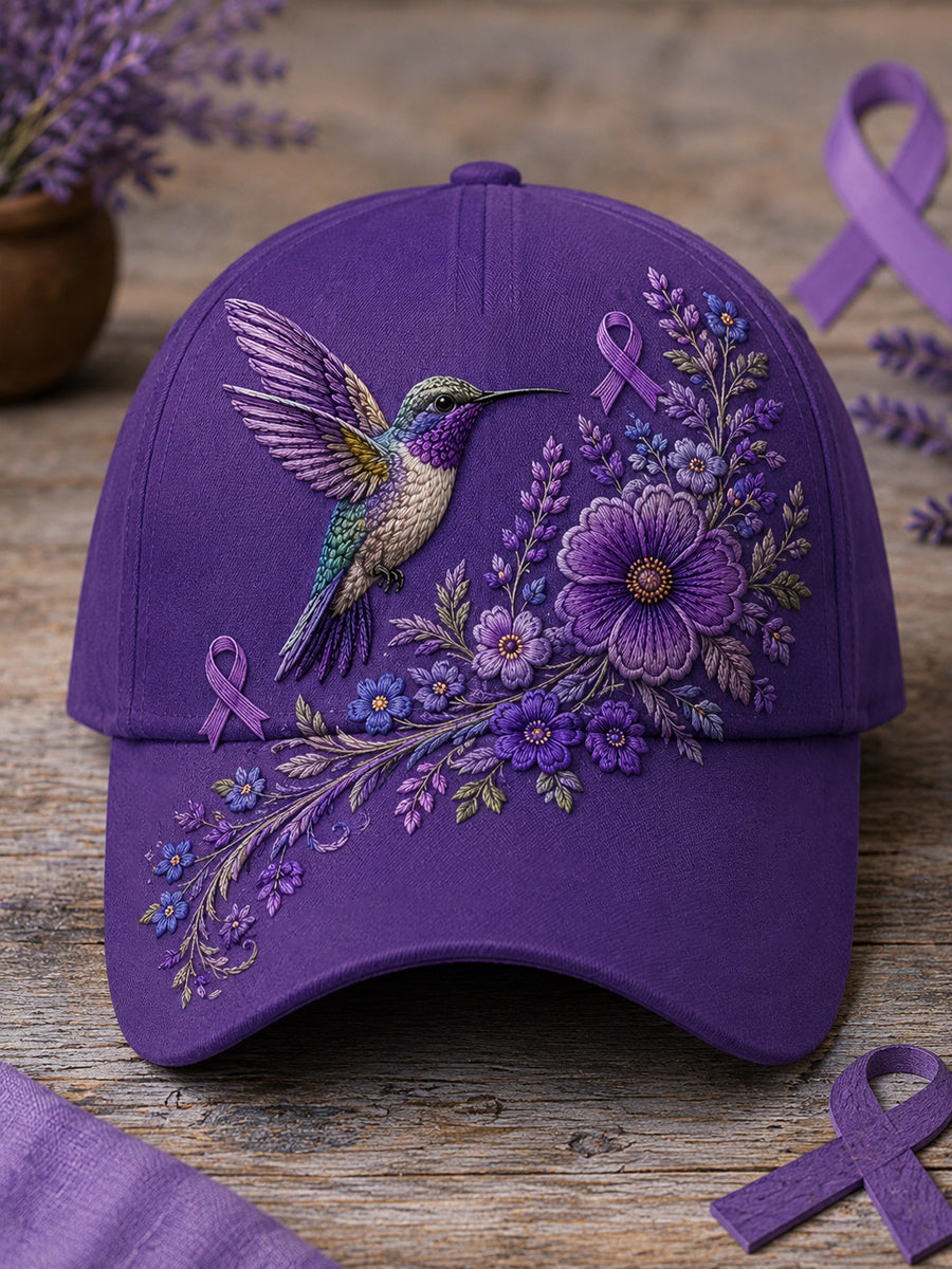 Unisex-Mütze in Lila mit Blumen- und Kolibri‑Muster zur Sensibilisierung für die Alzheimer‑Krankheit