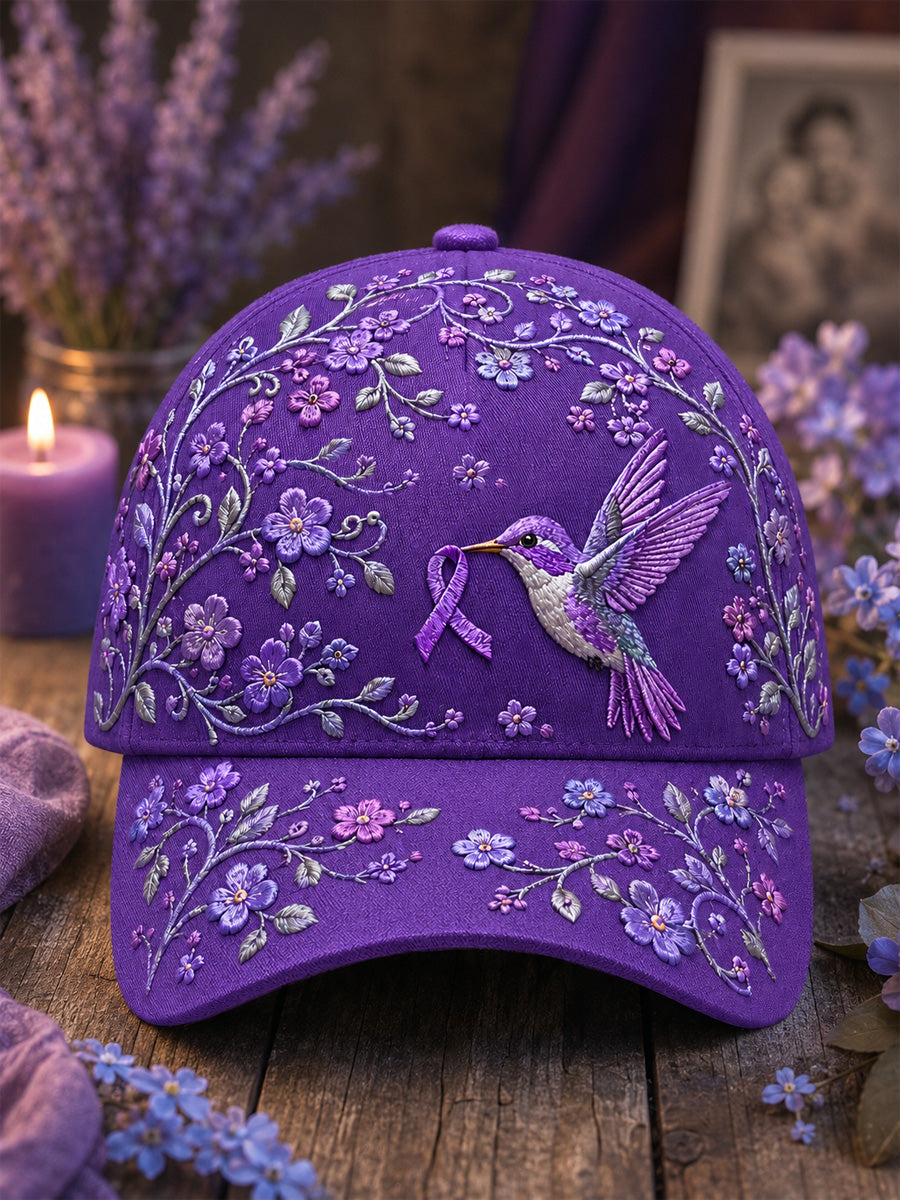 Unisex-Mütze in Lila mit Blumen- und Kolibri‑Muster zur Sensibilisierung für die Alzheimer‑Krankheit