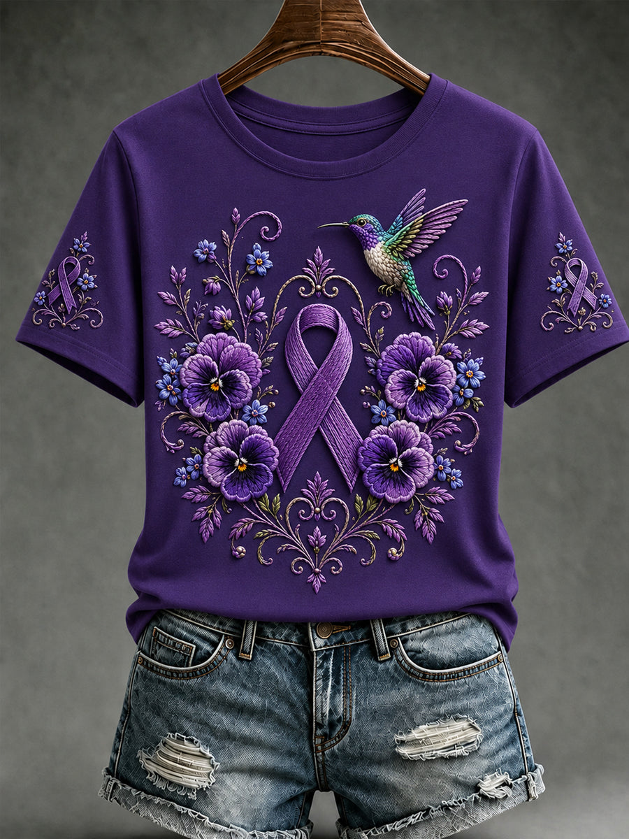 Damen-T-Shirt mit kurzem Ärmel und lila Blumen- sowie Kolibri-Print zur Sensibilisierung für die Alzheimer-Krankheit