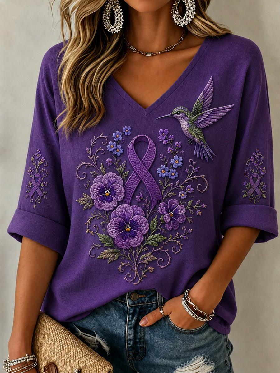 Damen-Oberteil in Lila mit Blumen- und Kolibri-Print, V-Ausschnitt, mittellange Ärmel – Unterstützung zur Sensibilisierung für Alzheimer