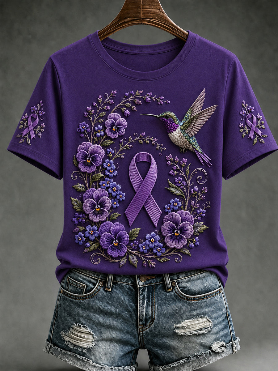 Damen-T-Shirt mit kurzem Ärmel und lila Blumen- sowie Kolibri-Print zur Sensibilisierung für die Alzheimer-Krankheit