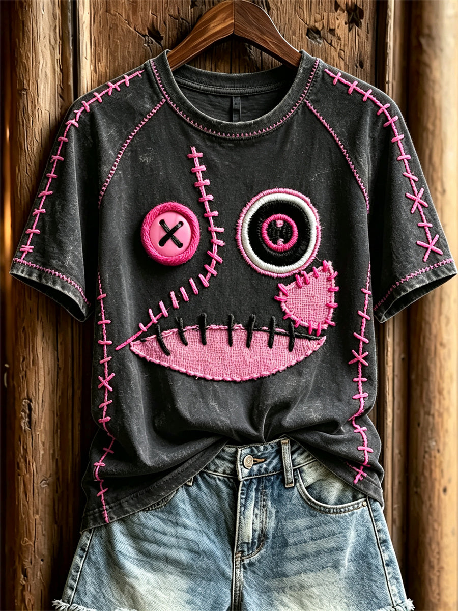 Damen-T-Shirt mit niedlichem Monstergesicht und pinkfarbenen Ziernähten, Kurzarm