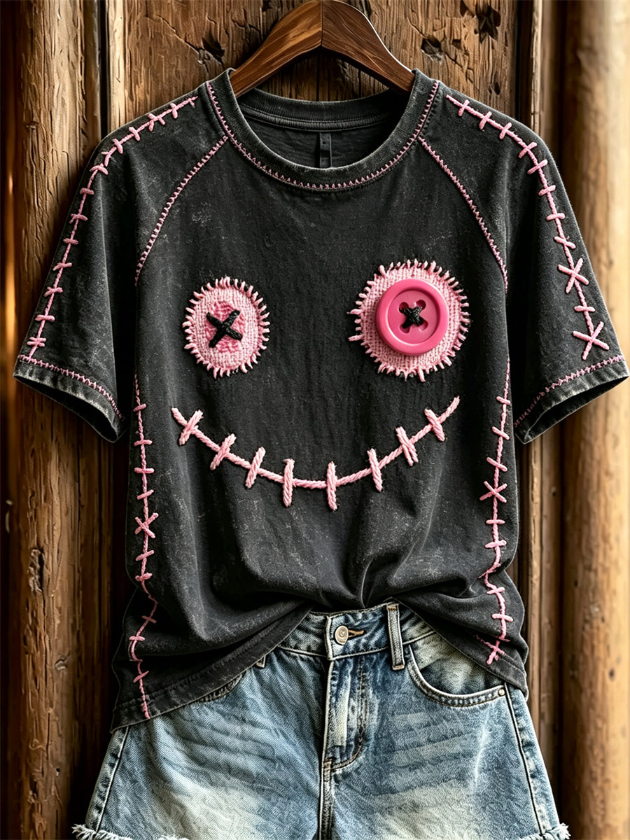 Damen-T-Shirt mit niedlichem Monstergesicht und pinkfarbenen Ziernähten, Kurzarm