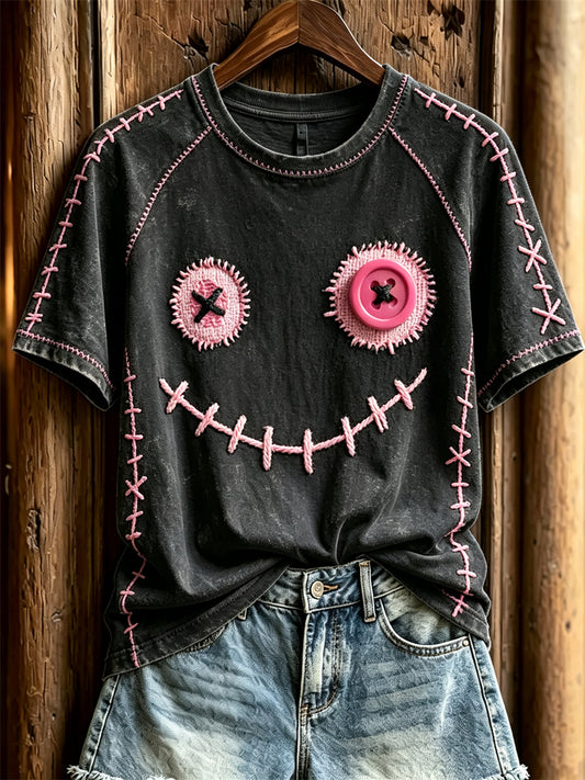Damen-T-Shirt mit niedlichem Monstergesicht und pinkfarbenen Ziernähten, Kurzarm