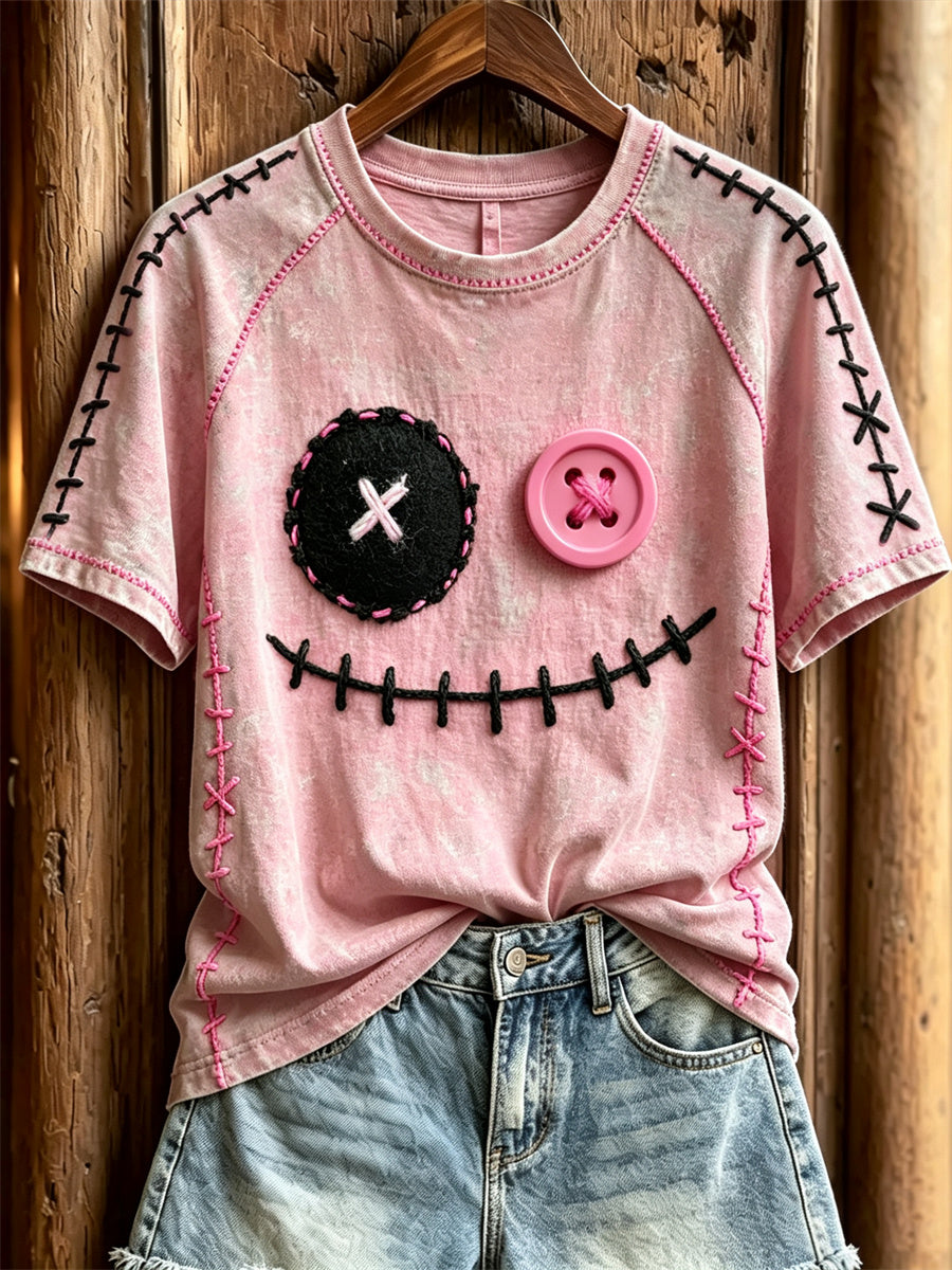 Damen-T-Shirt mit niedlichem Monstergesicht und pinkfarbenen Ziernähten, Kurzarm