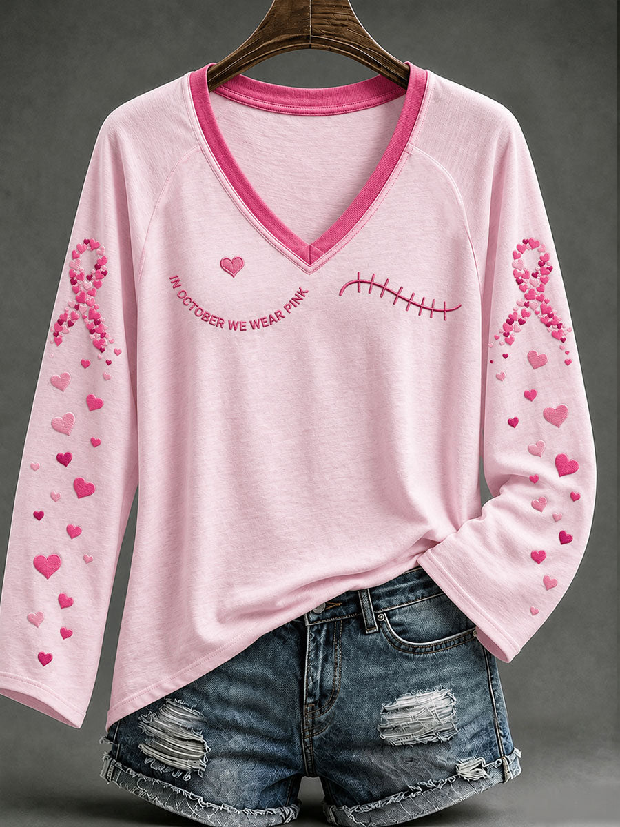 Frauen im Oktober tragen wir rosa V-Ausschnitt T-Shirt