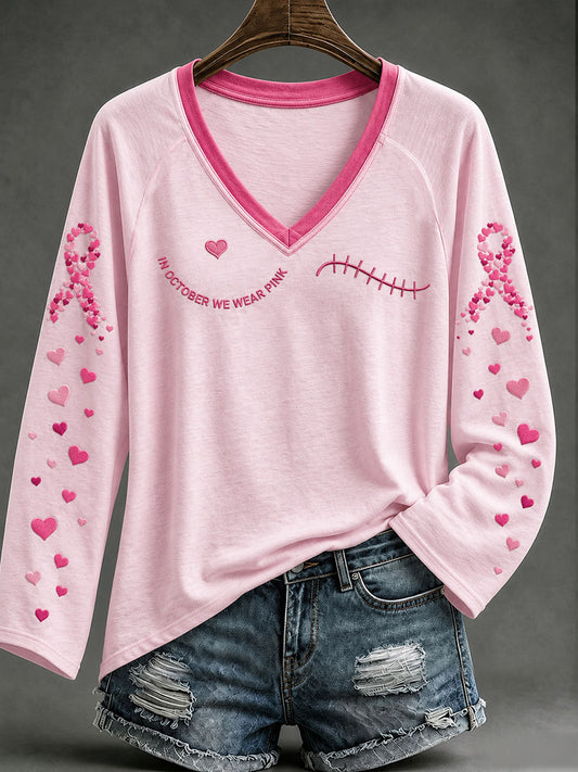Frauen im Oktober tragen wir rosa V-Ausschnitt T-Shirt